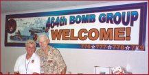 Art and Elise Rawlings in front of one of the banners. The banners were beautiful and the members tried to buy them from Elise......but no, no. She rolled them up in their tubes, took them home, and plans on taking them to Mobile, AL where the reunion will be held in 2004. 