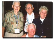 Left to right: Art Rawlings (778), Don Sherard (777), Elise Rawlings and George Krynovich (778) in the Hospitality Room.