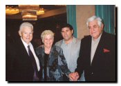 Left to right: Art and Elise Rawlings with father and son - Tom and John Tomlinson (778) - prepare to enter the banquet room.